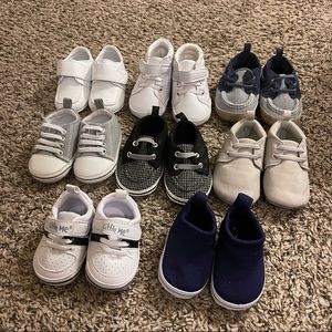 8 pairs of baby boy shoes. Like new. Size 1 and 2